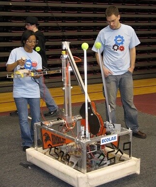 Humboldt students and their FIRST Robotics robot sponsored by Ecolab