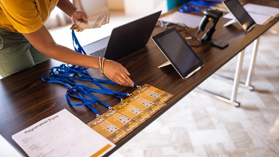 tradeshow lobby table with registered badges